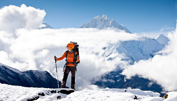 mountaineer-standing-on-summit-of-k2-mountain
