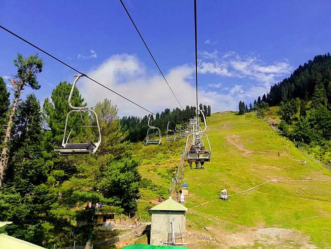 Photo of Malam Jabba ski slopes in summer, or the chairlift with mountain views.
