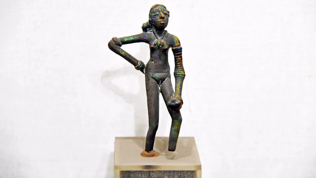 Photograph of the Dancing Girl bronze statuette, Mohenjo-daro, Indus Valley Civilization, approximately 2500 BCE.